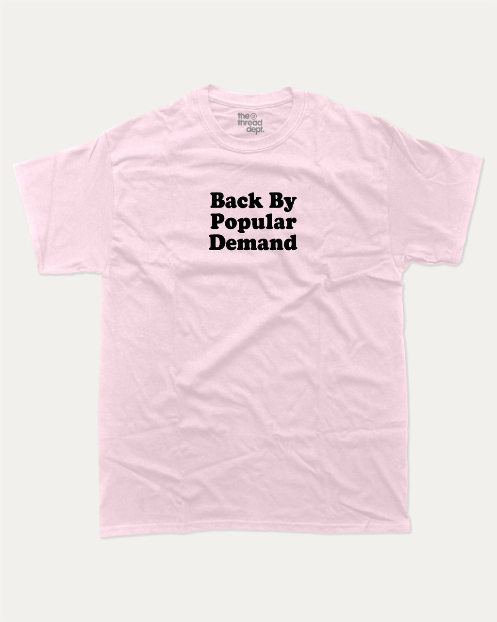 Back By Popular Demand graphic t-shirt, perfect for adults. A must-have funny back to school tee, trending meme shirt, unique gift idea. Pink.