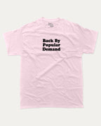 Back By Popular Demand graphic t-shirt, perfect for adults. A must-have funny back to school tee, trending meme shirt, unique gift idea. Pink.