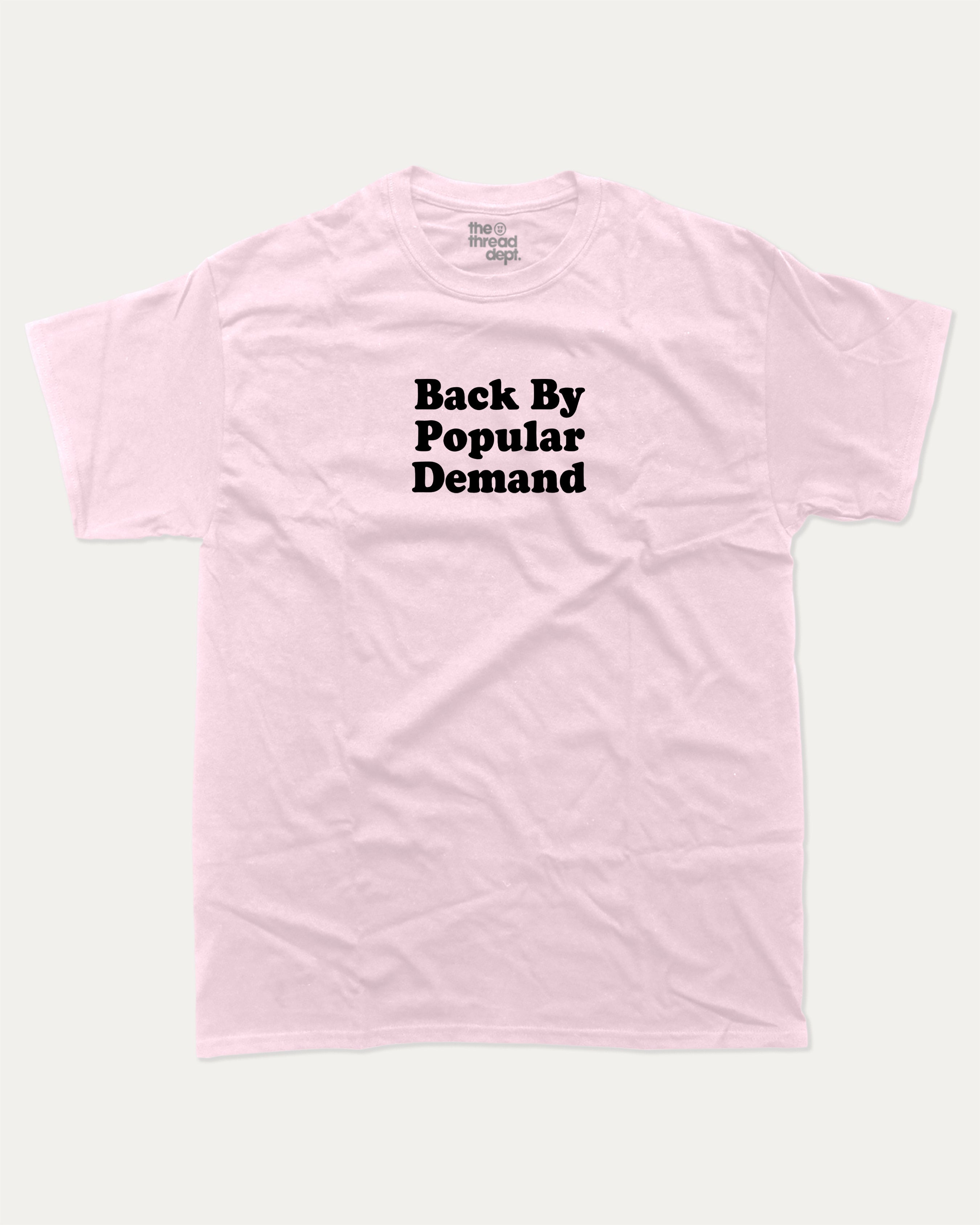 Back By Popular Demand graphic t-shirt, perfect for adults. A must-have funny back to school tee, trending meme shirt, unique gift idea. Pink.