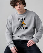 Person wearing a gray sweatshirt with 'Silly Goose' graphic design.