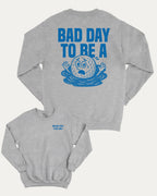 A Bad Day To Be A graphic sweatshirt with funny golf graphic, warm and cozy graphic for everyday wear. Perfect for adults and gift-giving. Heather Grey pullover.
