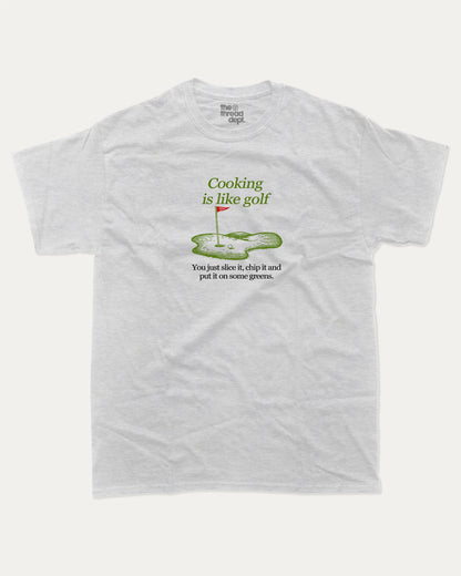 Cooking is like golf graphic tee with bold and humorous print, funny and trendy graphic. Perfect Gift for Golfers, Golf Graphic T shirt, Perfect for adults and gift-giving. Ash Grey shirt.