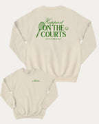 Happiest On The Courts graphic sweatshirt with retro tennis graphic, warm and cozy graphic for everyday wear. Perfect for tennis lover and gift-giving. Natural pullover.
