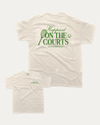 Happiest On The Courts graphic tee with retro tennis print, funny and trendy graphic. Perfect for adults and gift-giving. Cream shirt.