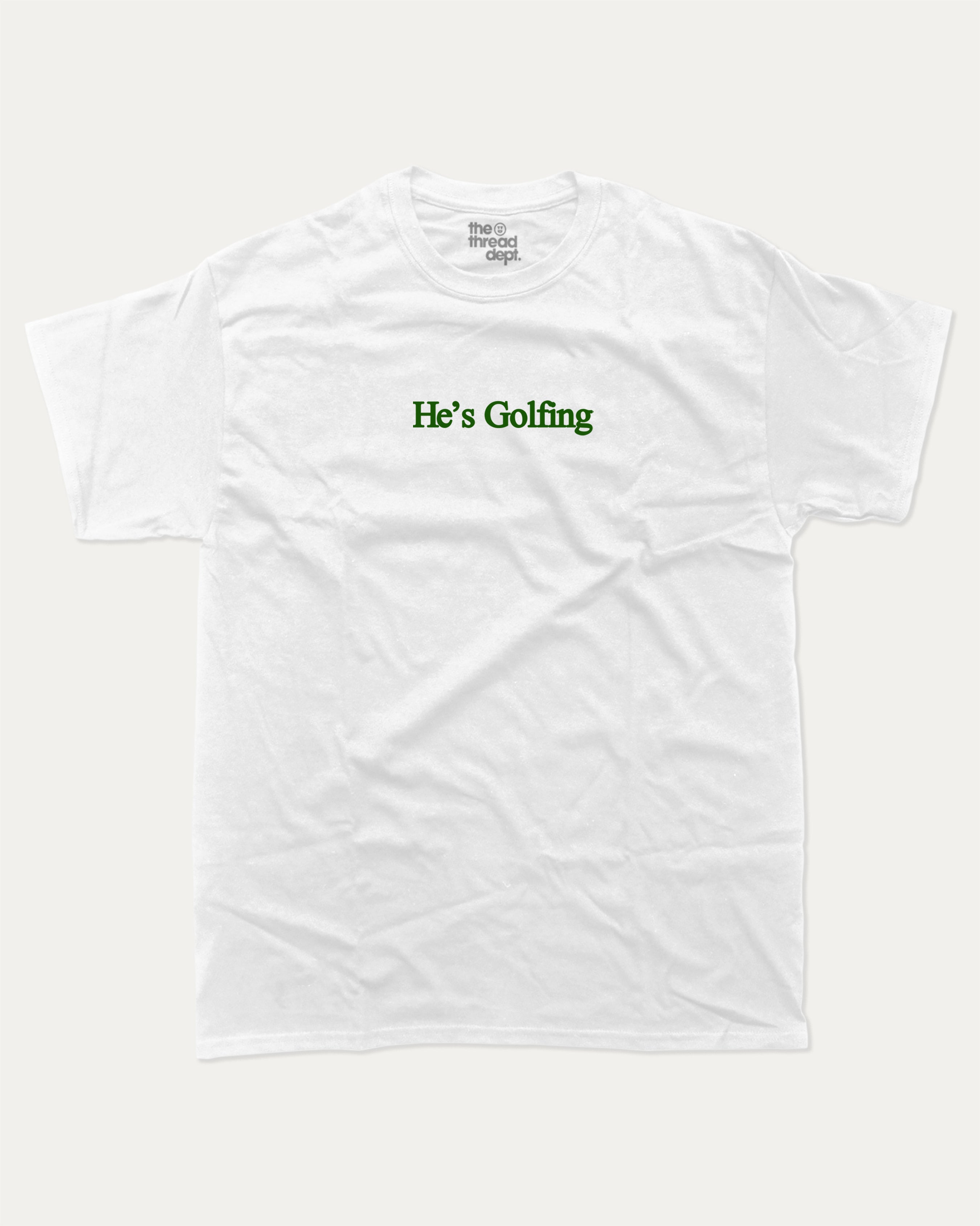 He's Golfing graphic tee with bold and humorous print, funny and trendy graphic. Perfect Gift for Golfers, Golf lovers Graphic t shirt,   Perfect for adults and gift-giving. White shirt.