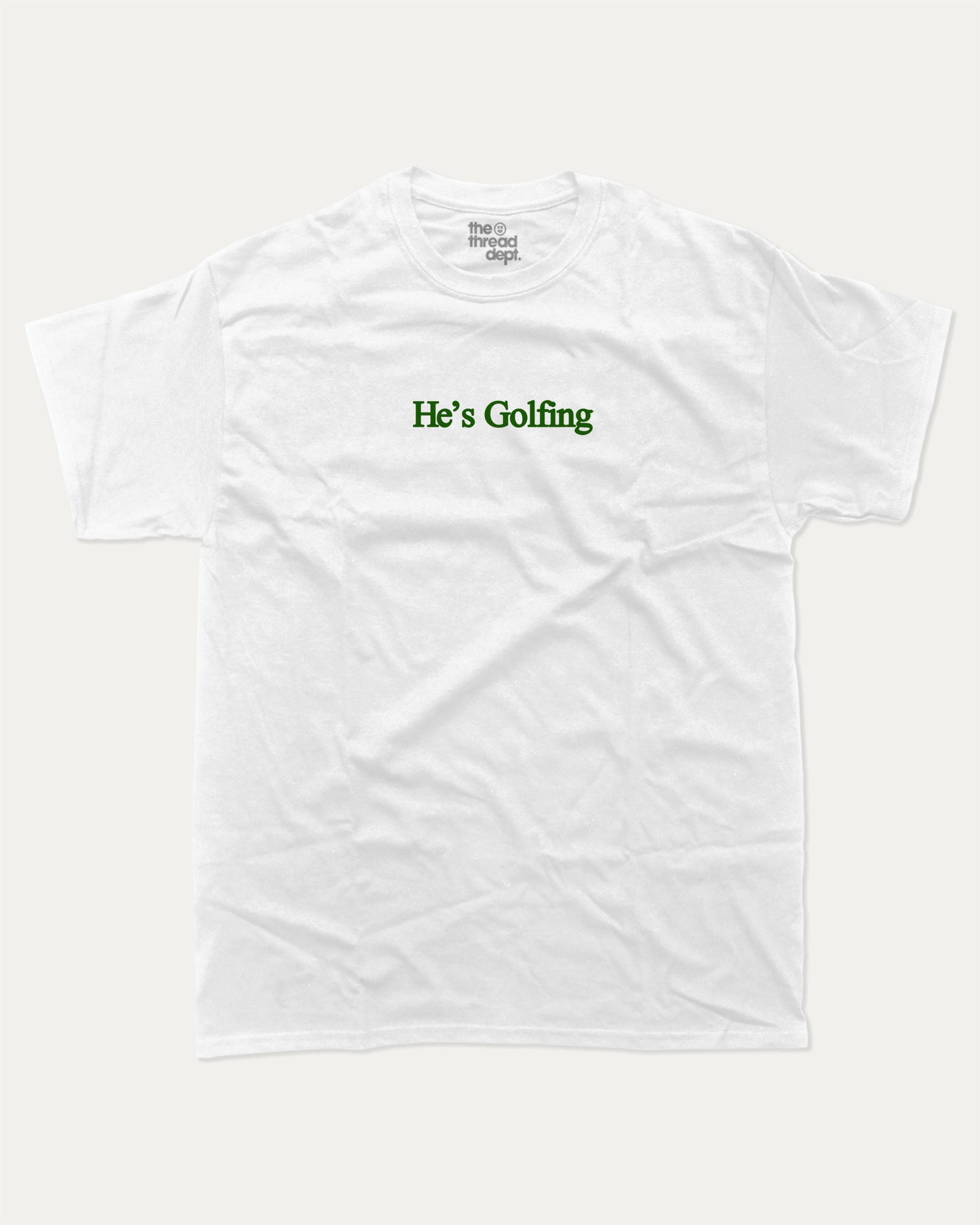 He's Golfing graphic tee with bold and humorous print, funny and trendy graphic. Perfect Gift for Golfers, Golf lovers Graphic t shirt,   Perfect for adults and gift-giving. White shirt.