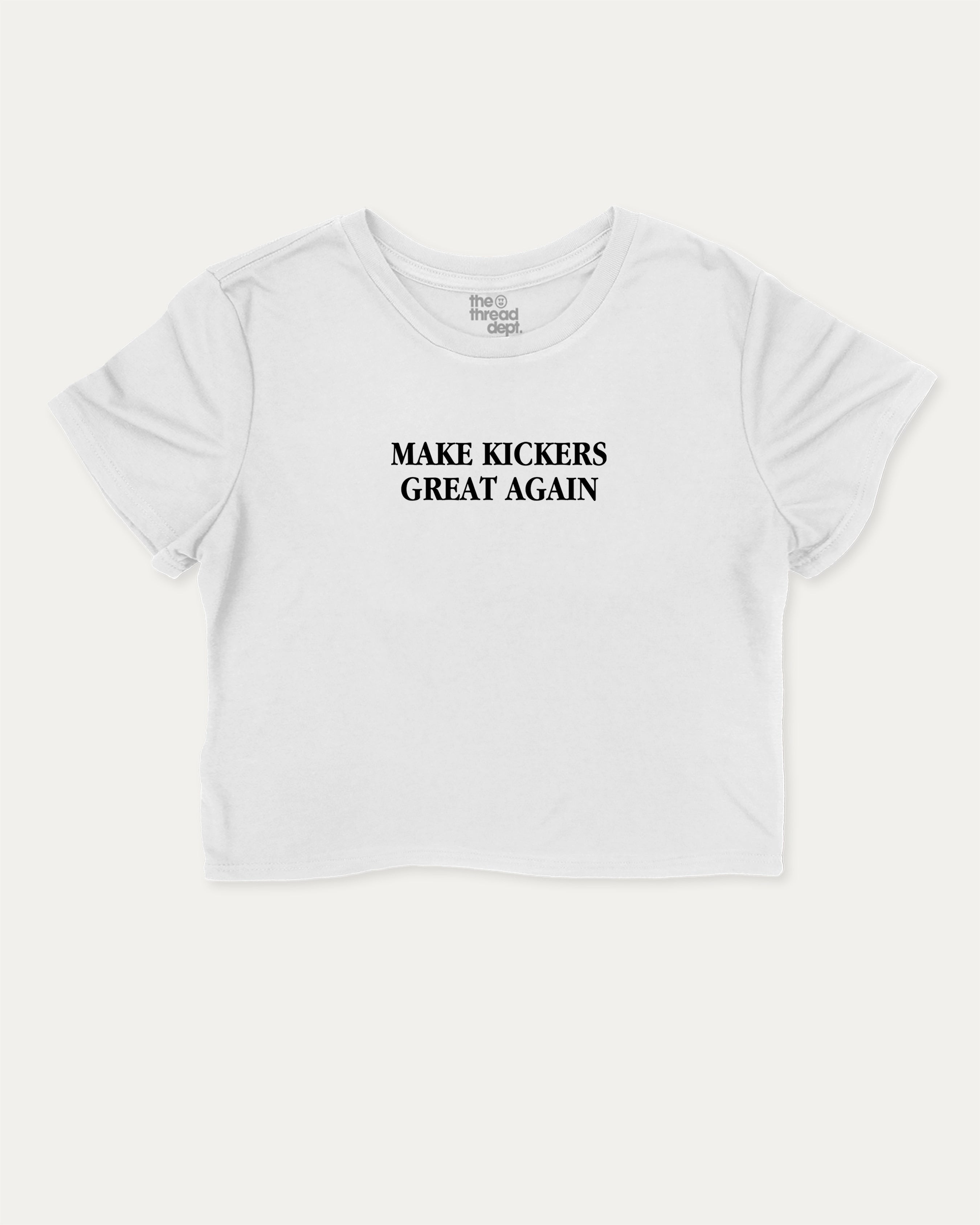 Make Kickers Great Again graphic crop tee with funny and trendy slogan print, perfect for women_ casual looks or layering. White crop t-shirt.