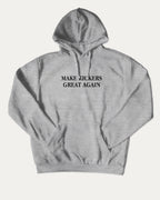 Make Kickers Great Again graphic hoodie with funny and trendy artwork, casual streetwear with bold personality. Great for adults and gifting. Heather Grey hoodie.