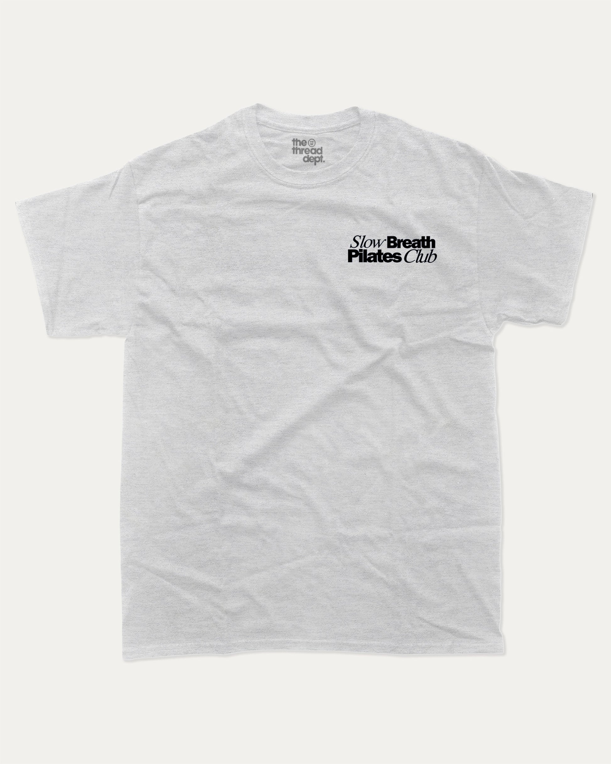 Slow Breath Pilates Club graphic tee with bold and humorous print, Pilates Graphic tee, Excercise Graphic tee, Workout t shirt, Perfect Gift for fit people, funny and trendy graphic. Perfect for adults and gift-giving. Ash Grey shirt.