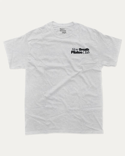Slow Breath Pilates Club graphic tee with bold and humorous print, Pilates Graphic tee, Excercise Graphic tee, Workout t shirt, Perfect Gift for fit people, funny and trendy graphic. Perfect for adults and gift-giving. Ash Grey shirt.