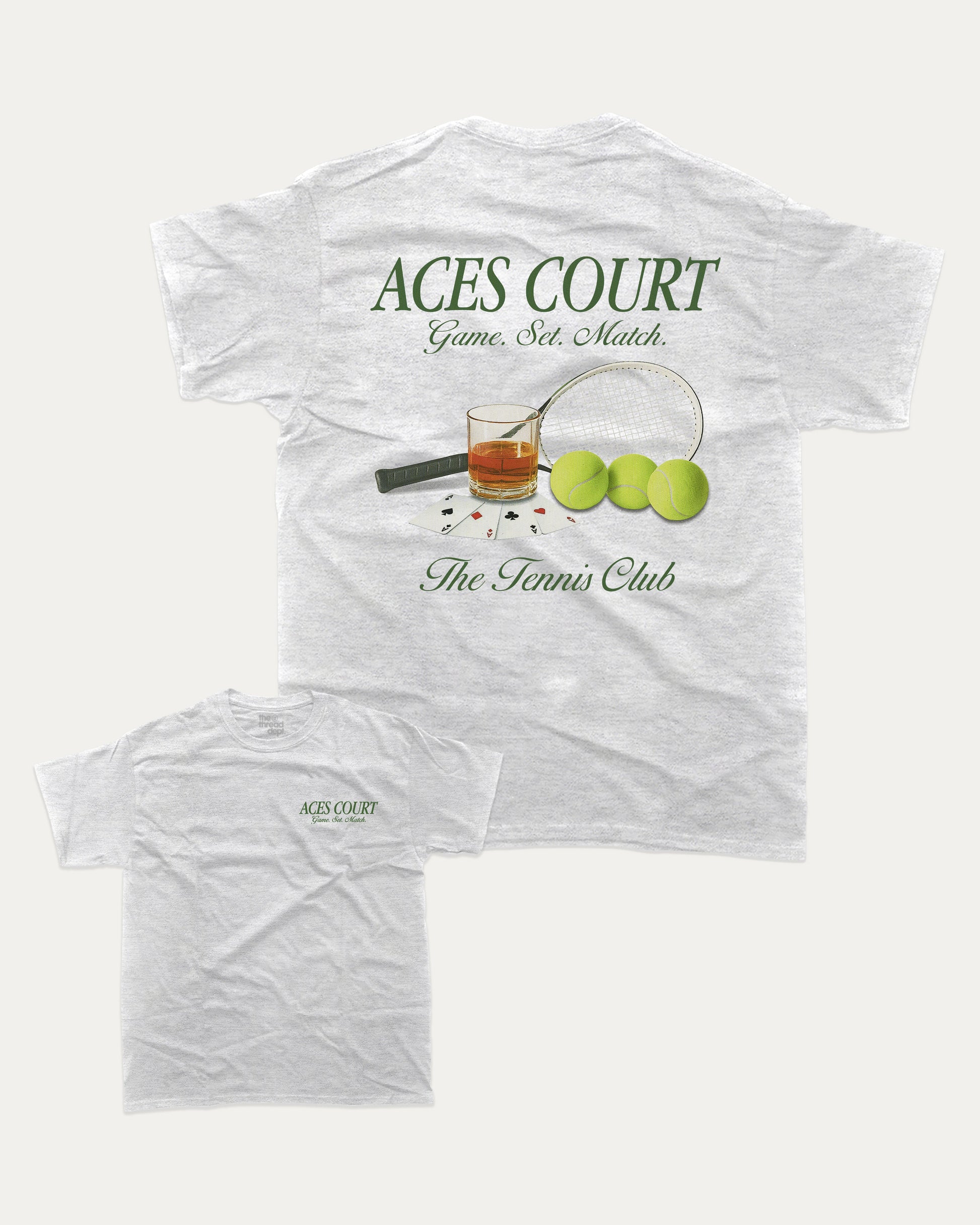 The Tennis Club graphic tee with bold and humorous print, Vintage tennis graphic. Perfect for adults and gift-giving. Ash Grey shirt.