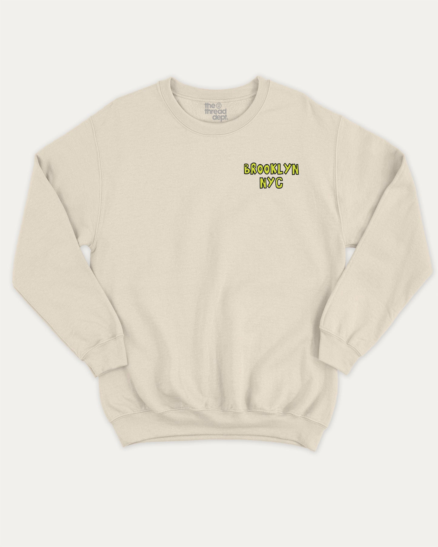 Brooklyn graphic sweatshirt with bold and humorous print, warm and cozy graphic for everyday wear. New York City Graphic Pull Over, State Graphic Pull Over Perfect for adults and gift-giving. Natural pullover.