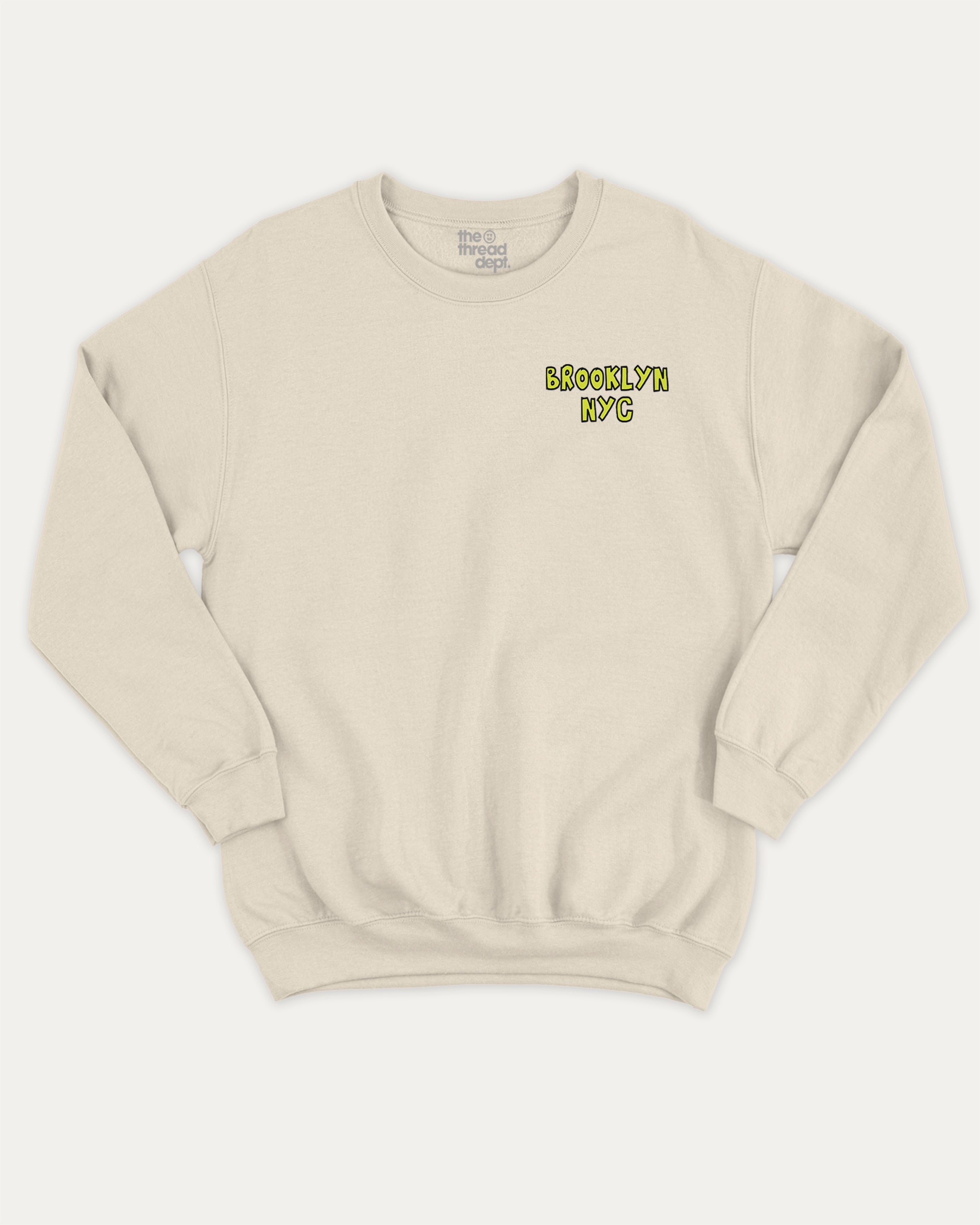 Brooklyn graphic sweatshirt with bold and humorous print, warm and cozy graphic for everyday wear. New York City Graphic Pull Over, State Graphic Pull Over Perfect for adults and gift-giving. Natural pullover.
