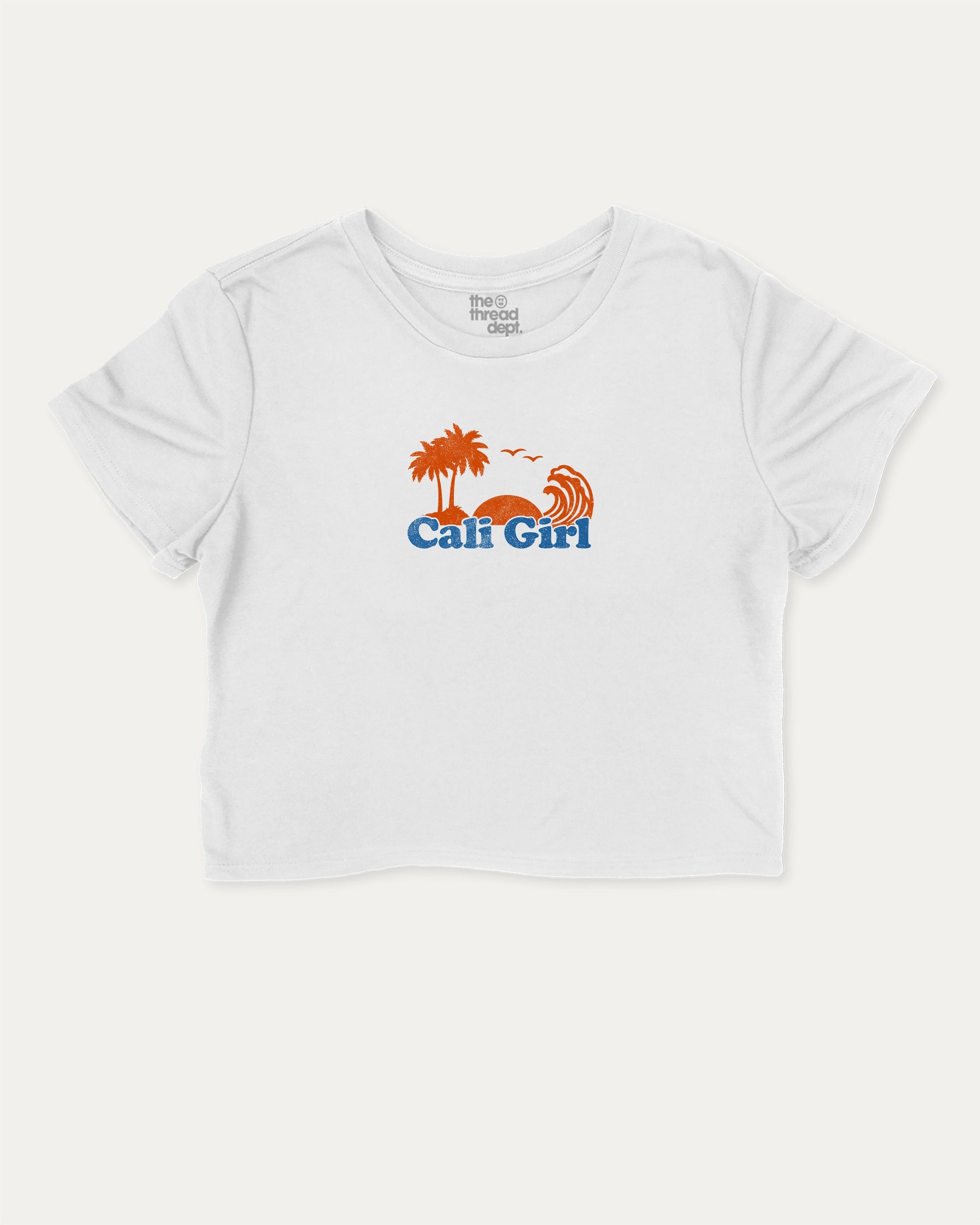 Cali Girl graphic crop tee with vintage california print, perfect for women’s casual looks or layering. White crop t-shirt.