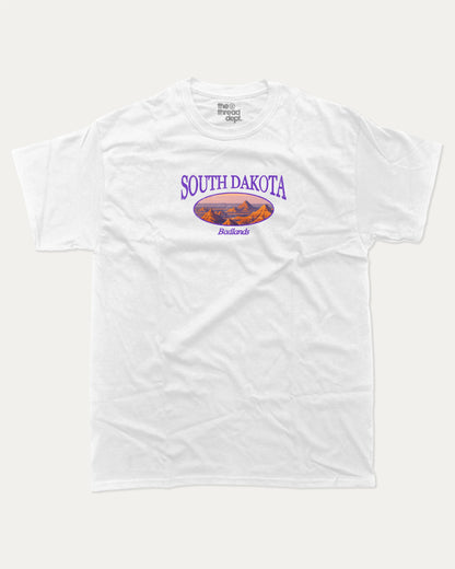 South Dakota graphic tee with bold and humorous print, State Graphic Tee, South Dakota State Graphic Tee,  funny and trendy graphic. Perfect for adults and gift-giving. White shirt.