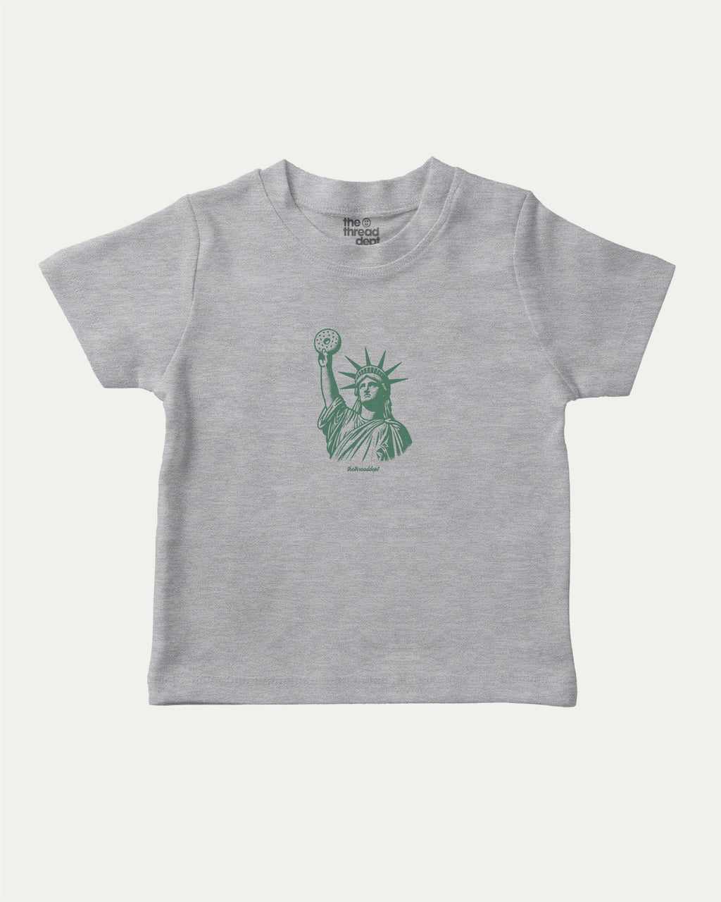 Statue of Liberty Bagle graphic tee with food and new york city print, funny and trendy graphic. Perfect for adults and gift-giving. Heather Grey shirt.