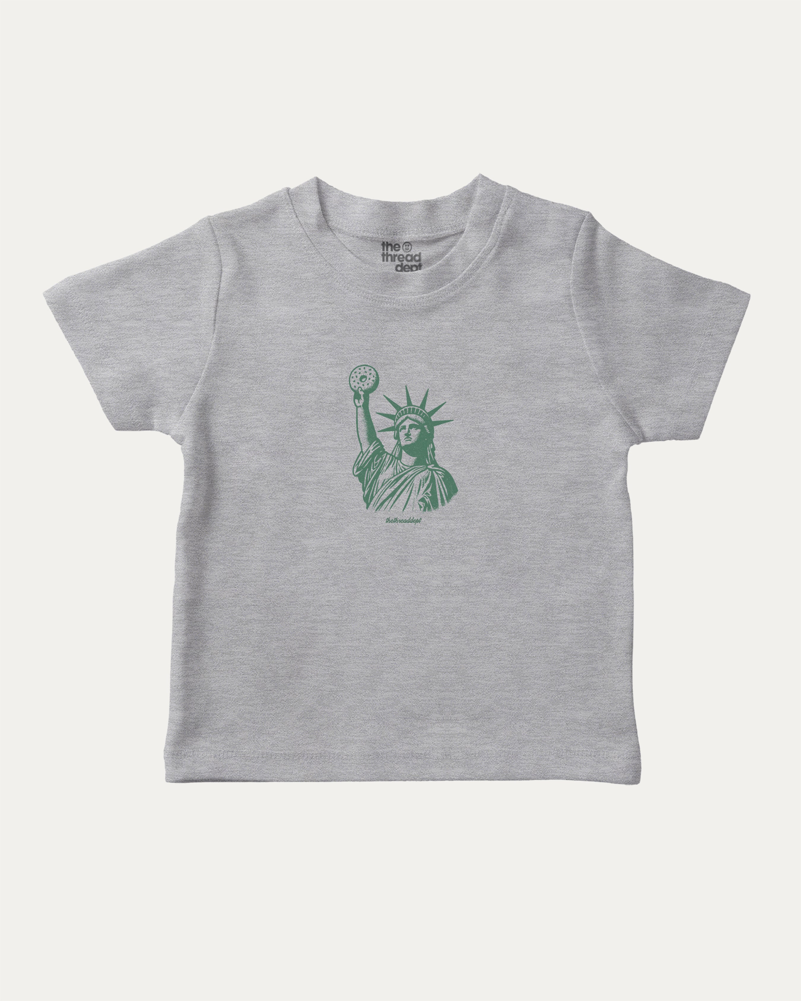 Statue of Liberty Bagle graphic tee with food and new york city print, funny and trendy graphic. Perfect for adults and gift-giving. Heather Grey shirt.