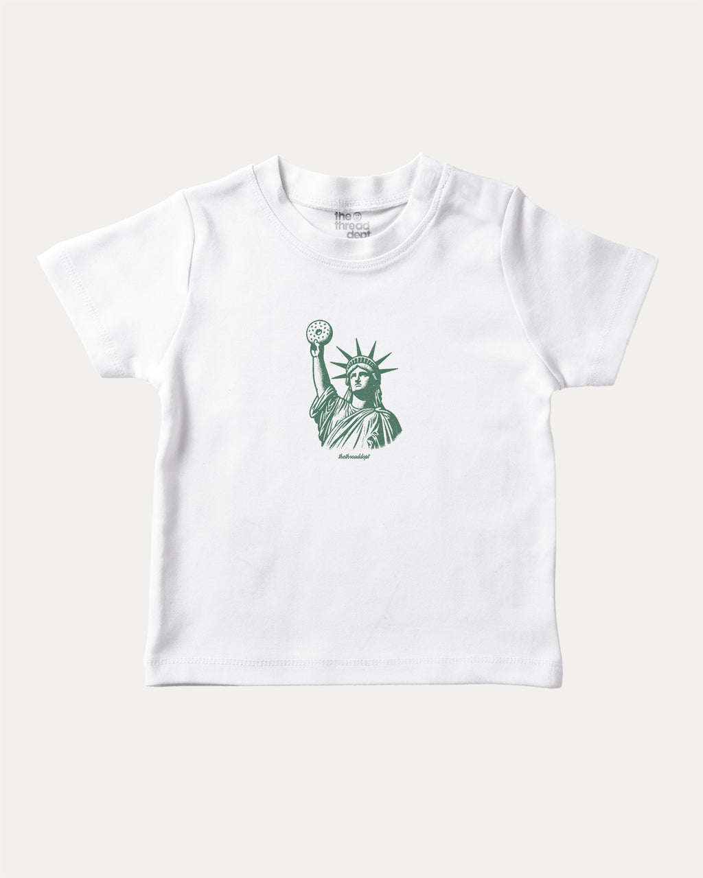 Statue of Liberty Bagle graphic tee with food and new york city print, funny and trendy graphic. Perfect for adults and gift-giving. White shirt.