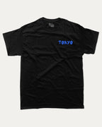 Tokyo graphic tee with bold and humorous print, funny and trendy graphic. Japan T shirt, Tokyo City T shirt, Perfect for adults and gift-giving. Black shirt.