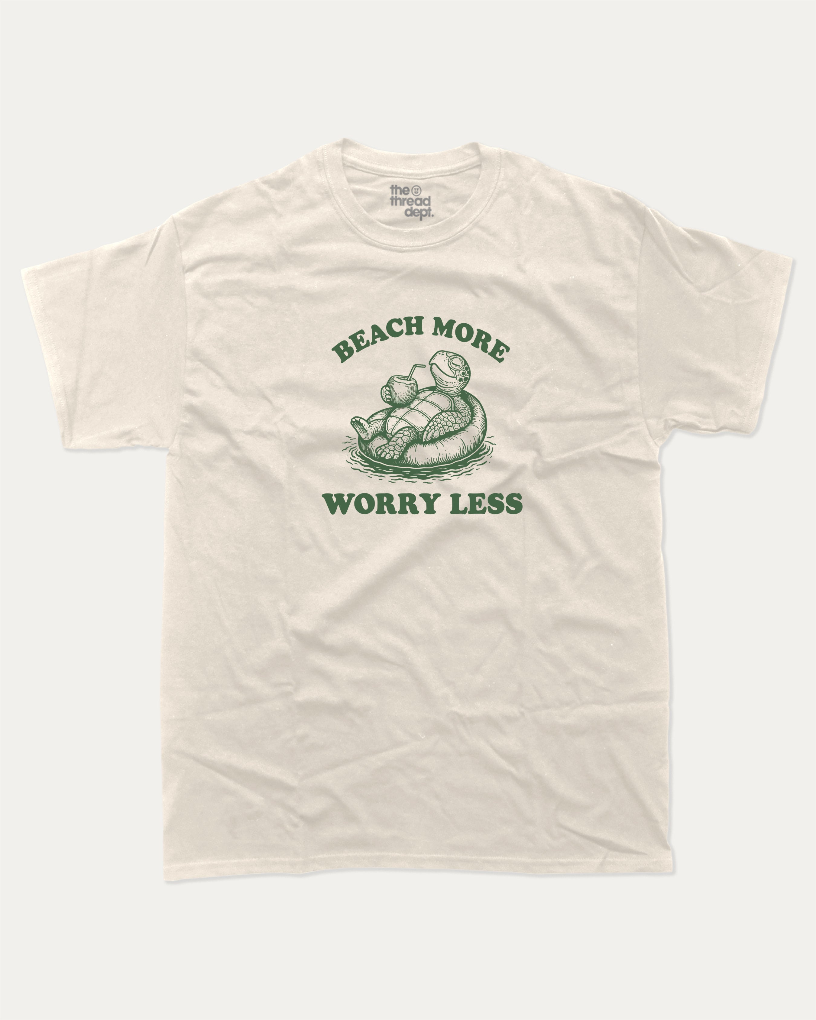 Beach More Worry Less graphic t-shirt, perfect for adults. A must-have funny summer tee, trending meme shirt, unique gift idea. Cream.