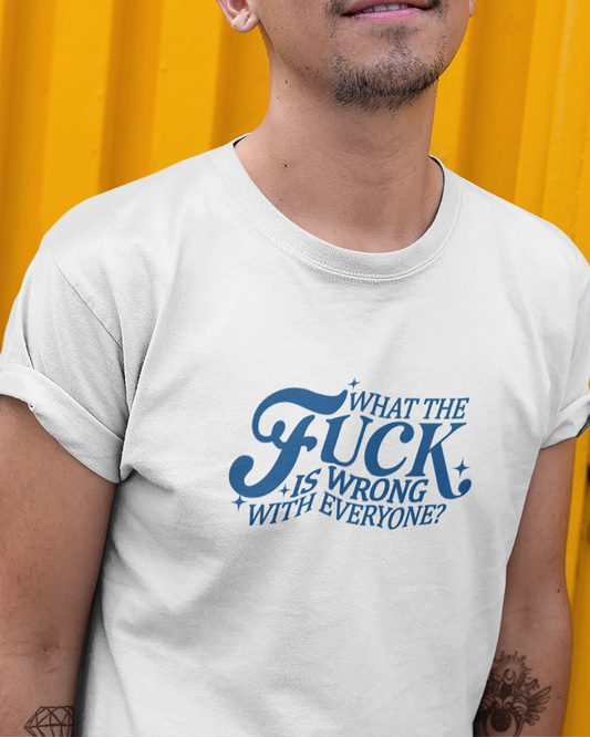 Person wearing a white t-shirt with what the fuck is wrong with everyone text against a yellow background