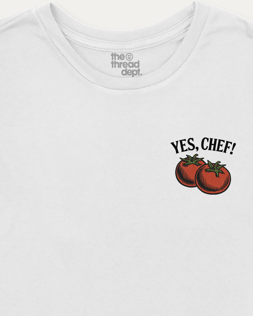 White t-shirt with 'Yes, Chef!' text and tomato graphics on a white background