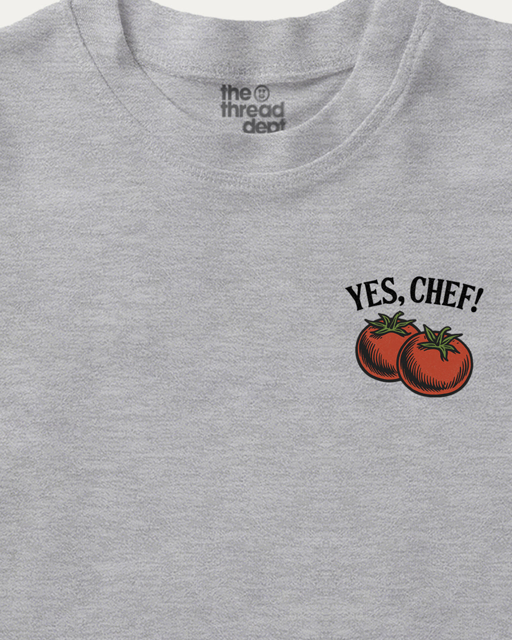 Gray t-shirt with 'Yes, Chef!' text and tomato graphics on a white background